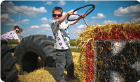 kid pretending to drive a tractor kid pretending to drive a tractor